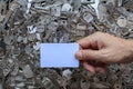 Locksmith holds a spare white key card over to the customer after the customer wishes to bring the key card to create a Royalty Free Stock Photo