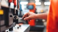 Locksmith inserting key into key cutting machine in modern workshop. Concept of locksmithing, key duplication, security