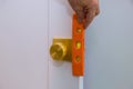 Locksmith install the door dummy lock in house Royalty Free Stock Photo
