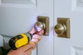 Locksmith install the door dummy lock in house Royalty Free Stock Photo