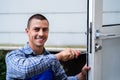Locksmith Lock Door Repair. Worker Changing Royalty Free Stock Photo