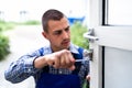 Locksmith Lock Door Repair. Worker Changing Royalty Free Stock Photo