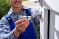 Locksmith Lock Door Repair. Worker Changing Royalty Free Stock Photo