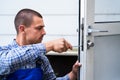 Locksmith Lock Door Repair. Worker Changing Royalty Free Stock Photo