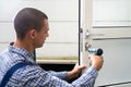 Locksmith Lock Door Repair. Worker Changing Royalty Free Stock Photo