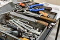 Locksmith`s box with keys and tools for repairing mechanical equipment