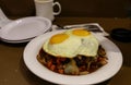 Loco Moco , traditional Hawaiian cuisine , burger patty on rice with a fried egg and brown gravy sauce