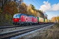 Locomotive freight train driving in the countryside