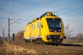 Locomotive freight train driving in the countryside