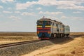 Locomotive train is passing through desert Royalty Free Stock Photo