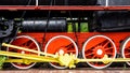 Locomotive wheels from an old fashioned steam train Royalty Free Stock Photo