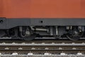 Locomotive wheels on railway tracks. Train wheels close-up on tracks