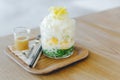 Lod Chong, Thai melon, puffed rice with coconut snow ice topping with sliced jackfruit. Served with caramel