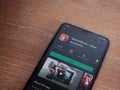 Autodesk SketchBook - draw and paint app play store page on mobile smartphone on wooden background