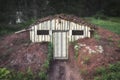 Lodgings blend in with nature. Dugout, hut in the forest. Hermitage.