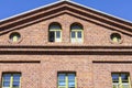 Facade of restored building of former textile factory in urban complex Ksiezy Mlyn (Priest\'s Mill), Lodz, Poland Royalty Free Stock Photo