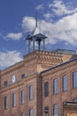 Facade of restored building of former textile factory in urban complex Ksiezy Mlyn (Priest\'s Mill), Lodz, Poland Royalty Free Stock Photo