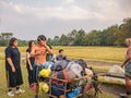 Unacquainted porter man waiting trekkers to pick them Bag on Phu Kradueng mountain national park in Loei City Thailand