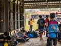 Unacquainted  trekkers waiting to pick them Bag from poster man on Phu Kradueng mountain national park in Loei City Thailand Royalty Free Stock Photo