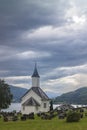 The Loen Church, a parish church of the Church of Norway, pictued here on an overcast evening, was built around 1330