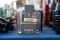 Loewe Solo perfume bottle at the flea market. Royalty Free Stock Photo