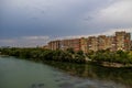 Lof the Ebro river and apartment blocks in Zaragoza, Spain on a cloudy summer day Royalty Free Stock Photo