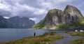 Stunning Lofoten Islands landscape with dramatic mountains and water.