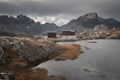 Lofoten Islands Norway. Mountain autumn landscape. Hike to Mount Munken, wooden houses, a shelter and a lake Royalty Free Stock Photo