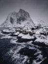 Lofoten Islands, Reine, Norway and Hamnoy fishing village with red rorbuer houses in winter nature panorama landscape