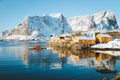 Lofoten winter scenery with traditional fisherman Rorbuer cabins, Sakrisoy, village of Reine, Norway Royalty Free Stock Photo