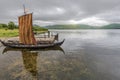 Lofotr, Norway - August 2, 2017 Reconstructed Viking ships in the border of Innerpollen salty lake in Vestvagoy island of Lofoten