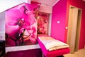 Loft bedroom conversion with orchid theme Royalty Free Stock Photo