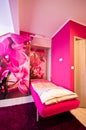 Loft bedroom conversion with orchid theme Royalty Free Stock Photo