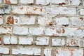 Loft damaged texture, wallpaper and background with painted red bricked wall colored in white