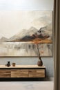 Loft interior in beige shades, abstract painting with a mountain landscape on the wall.