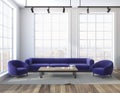 Loft living room purple sofa, two armchairs Royalty Free Stock Photo