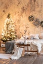 Loft style apartments, Christmas tree wreath. Bed in the bedroom, high large Windows