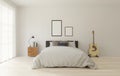 3D rendering Loft style bedroom with white wall ,wooden floor,big window,guitar, frame for mock up Royalty Free Stock Photo