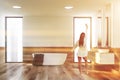 Loft white bathroom with double sink, woman Royalty Free Stock Photo