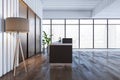 Loft wooden and concrete office lobby interior with reception desk, panoramic window with city view and other objects. Waiting Royalty Free Stock Photo