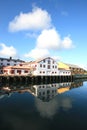 Lofts of the harbour of Kabelvoag mirroring Royalty Free Stock Photo
