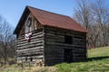 Log Barn with an American Banner - 3 Royalty Free Stock Photo