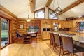 Log cabin house interior of dining and kitchen room Royalty Free Stock Photo