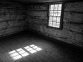 Log Cabin Interior, Window and Sun Pattern on Floor B&W Royalty Free Stock Photo