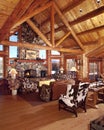 Log cabin living room with western furninshings Royalty Free Stock Photo