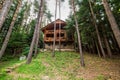 Log cabin in the pine forest Royalty Free Stock Photo