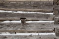 Log cabin sawn logs to corner closeup with snow in between Royalty Free Stock Photo