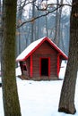 Log cabin in snow woods Royalty Free Stock Photo