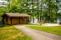 Log cabin surrounded by the forest at lake santeetlah north caro Royalty Free Stock Photo