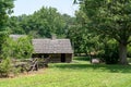 Log Cabin under Oak Tree Royalty Free Stock Photo